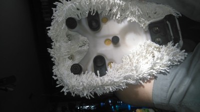 Ein "flokati" WC Vorleger als Sitzauflage.